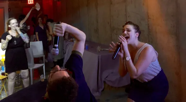 Karaoke singers performing 