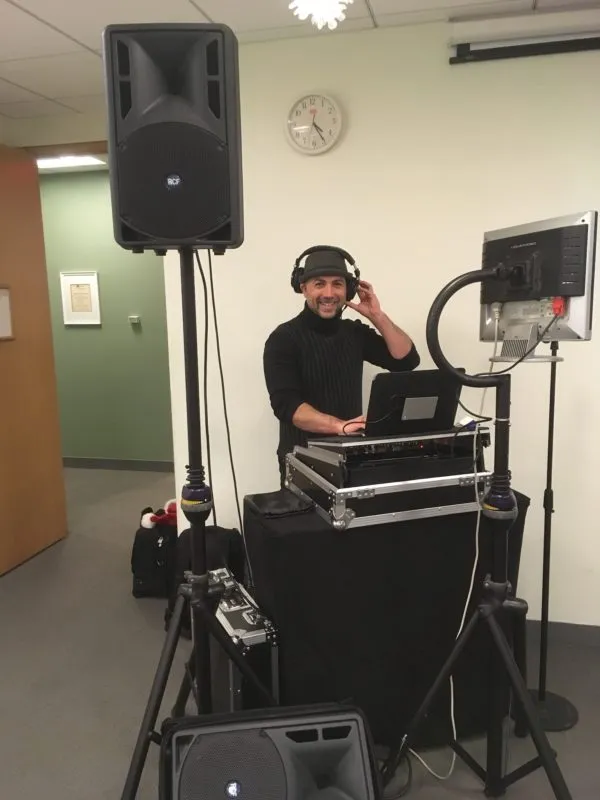 full frontal of DJ Alberto and his dj and karaoke equipment