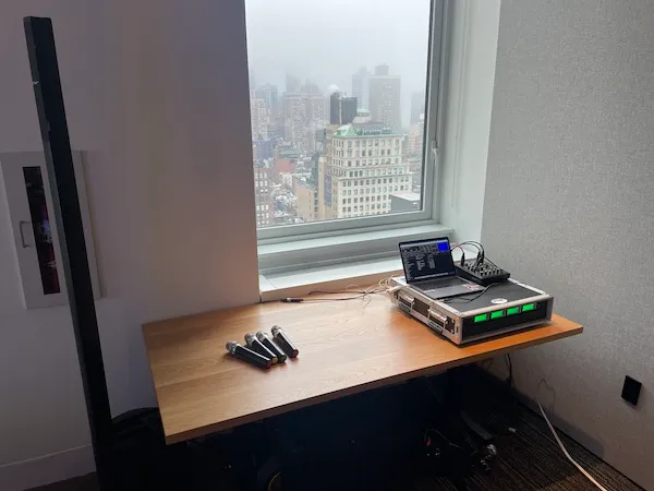 Full karaoke rental setup with mixer, screen, and PA at a private event